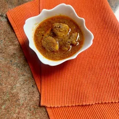 Our Goan Pork Vindaloo, a dish known for its bold, tangy, and spicy flavors. We use coconut vinegar to give it that authentic tartness that perfectly balances the red chilies and garlic.