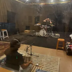 A look inside a creative studio session. This is where the magic begins, with musicians from different backgrounds coming together to jam and create something new.