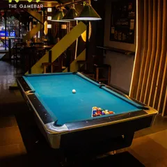 The pool table is the heart of the bar. With professional lighting and a well-maintained surface, it's the perfect spot to rack 'em up and show off your skills any night of the week.