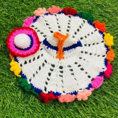 This white woolen dress features a vibrant, multi-colored border of small petals. It comes with a matching cap, making it a complete and colorful winter set.