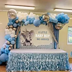 Welcoming a little one with our adorable elephant-themed decor. This setup features a full backdrop announcing "A Little Baby Boy Has Arrived," framed by a beautiful balloon arch in shades of blue, white, and silver, perfect for a joyful baby welcome party.