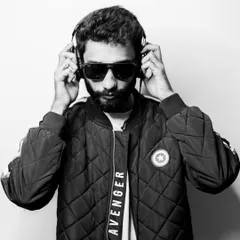 A black and white portrait from my press kit shoot. Just me and my headphones, ready to make people move.