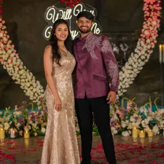 This look is perfect for a modern engagement or pre-wedding event. I created this custom deep purple bandhgala jacket with striking silver embroidery on the shoulder and sleeve, offering a contemporary yet regal style.