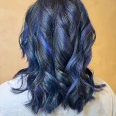 This is my Midnight Blue Rose vibe. I created a multi-tonal look with deep sapphire and violet hues melting together for a galaxy-inspired effect. This is a bleach color, perfect for anyone wanting to make a statement.