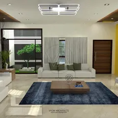 A living room designed around an internal courtyard, visible through a large glass window. This feature brings nature and light into the heart of the home, creating a serene and bright atmosphere.