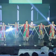 The precision of dandiya choreography is on full display here. Our dancers perform a synchronized sequence, a key element of our folk dance productions.