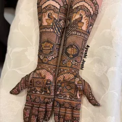 A beautiful bridal design focusing on the grace of peacocks and the strength of elephants. The patterns are dense and symmetrical, creating a stunning effect without any human figures.