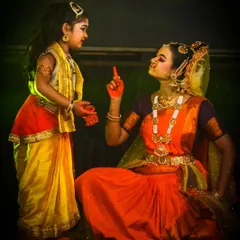 A tender scene depicting Mother Yashoda with young Krishna, showcasing the emotional depth and narrative focus of our dance dramas. These intimate moments of storytelling are what make our performances resonate so deeply with audiences of all ages.