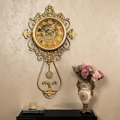 Our vintage gold wall clock is more than just a timepiece; it’s a statement of old-world charm. The ornate detailing and exposed moving gears create a functional work of art that brings elegance to any entryway or living room.