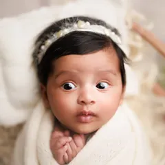 Curious from the very beginning. I love it when I get to capture a baby's wide-eyed wonder as they take in the world around them.