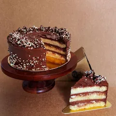 My Wannabe Chocolate Cake, now available by the slice on Swiggy and Zomato. It's a moist vanilla sponge with the most decadent chocolate buttercream. It's egg-free, but you'd never believe it.