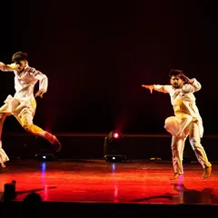 This is the kind of energy we bring to the stage. A powerful, synchronized performance from our "Inquilab" production, this image showcases the dynamic and expressive choreography we create for men's group dances, perfect for a groom's squad or family performance.