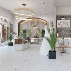 This is a retail space we designed for the 'Beige Bag' boutique. Our goal was to create a serene shopping environment using terrazzo flooring, natural stone walls, and warm wood, allowing the products to be the heroes of the space.