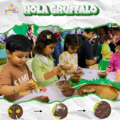 Making our own "terrible tusks" and "purple prickles". The children created their own Gruffalo crumble, an edible art activity that brought the story's details to life.
