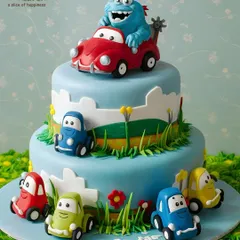 From friendly monsters to speedy cars, we love bringing your child's imagination to life! This fun, two-tiered 3D cake was designed for a special birthday, combining their favourite things into one delicious adventure.
