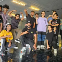 The SDDP is a comprehensive program designed to build professional dancers. Here, students are seen after a challenging session, growing together as a crew.