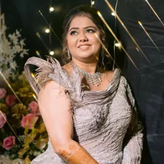 If elegance had a highlight, it would be this glam. This professionally shot photo captures the shimmering details of her silver gown and the radiant makeup I created for her cocktail party.