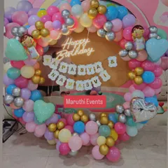 A lovely pastel-colored balloon ring for a joint birthday celebration for Tapasya and Namasvi, complete with a neon sign.
