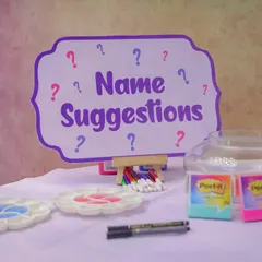 A "Name Suggestions" station is a sweet and interactive way for guests to share their favorite baby names. We set up everything you need, from the sign and pens to a jar for collecting the wonderful ideas.