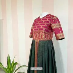 An example of our commitment to slow fashion. We transformed a client's stained vintage Kanjeevaram saree into this gorgeous, wearable dress, giving a cherished heirloom a new life.