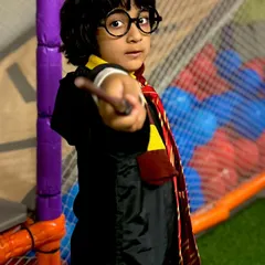 A young wizard ready to cast a spell! This Harry Potter costume is perfect for a magical birthday adventure.