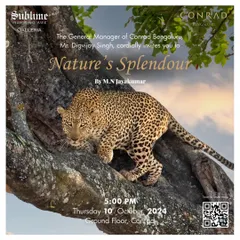 The invitation for 'Nature's Splendour' at the Conrad Bengaluru, featuring a powerful photograph of a leopard on a tree.