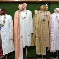 Just a glimpse of the variety I keep in my store. This is a lineup of some of our ready-to-wear sherwanis in different colors and fabrics, from rich reds to elegant whites and golds, each with its own unique work.