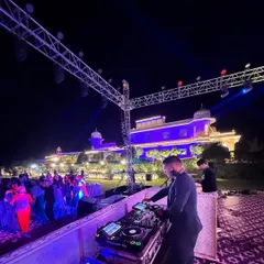 I have the experience to handle grand-scale destination weddings. This was a spectacular outdoor reception at a palace hotel in Jaipur, where the lighting, sound, and music came together for an unforgettable night.
