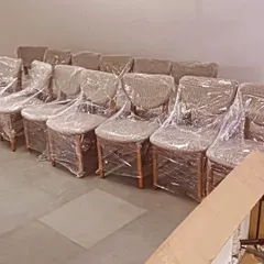 A bulk order of dining chairs, wrapped and ready for delivery to a restaurant in Chembur, Mumbai. We specialize in supplying durable and stylish seating solutions for the hospitality industry.