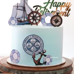 A retirement cake for someone from the Mumbai Port Authority. I designed it with a nautical theme, including an anchor, a ship's wheel, a compass, and the official MPA logo.