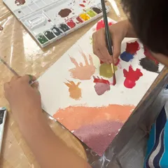 A conversation with a 5-year-old about his painting of asteroids hitting the sun. This is process art in action: the story and the idea behind the painting are just as important as the painting itself.