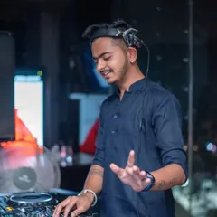 Proving myself through my work, not just words. This photo shows me in an ethnic kurta, ready for a themed night, but with the same intense focus on the console.