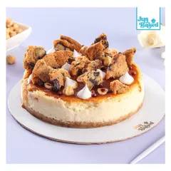For those who love a bit of crunch and a sweet and salty kick, this is my Caramel Seasalt Cheesecake. It's topped with caramel sauce, crunchy cookie pieces, and roasted hazelnuts.
