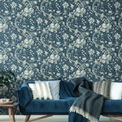 The Heritage Prints collection from Wallquest blends trendy colors with a modern take on classic Arts & Crafts inspired designs. This intricate blue and beige floral damask creates a sophisticated and timeless living space.