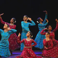 A dynamic group pose from my students' stage performance. The vibrant costumes and focused expressions show their confidence and joy in sharing their art with the rasikas.