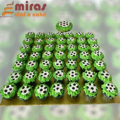 I prepared this large set of football-themed cupcakes for a corporate team event. Each cupcake is decorated with buttercream grass and a tiny soccer ball, making for a fun and shareable treat.