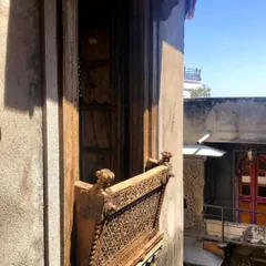 Another example of a traditional Rajasthani jharokha, or enclosed balcony, with intricate latticework. These architectural elements inspire our designs for creating private, shaded outdoor spaces.