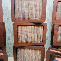 A batch of my custom piggy banks, showing the savings tracker grid. You can choose a savings goal of 21,000, 50,000, or 1 lakh.