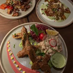 A look at some of the custom-plated dishes I offer for private dinners. This trio includes modern Indian appetizers like soya chaap and dahi bhalla chaat, each presented with artistic sauces and garnishes.