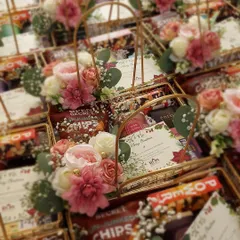 Our Christmas hampers are curated with festive treats and decorated with floral arrangements. They are the perfect way to send warm wishes to clients, loved ones, and employees.