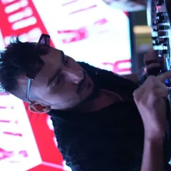 Fine-tuning the mix on the fly. Being a DJ is about reading the crowd and making real-time adjustments to create the perfect journey through sound.