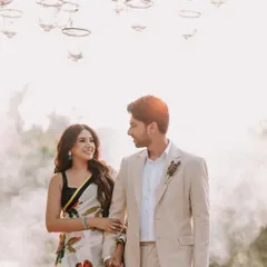 A dreamy, romantic shot of Armaan Malik and Aashna Shroff during their engagement. The soft light and natural setting create an ethereal atmosphere, perfect for capturing the magic of new beginnings.