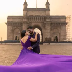 An epic shot for an epic love story. The long, flowing trail of this purple gown against the Mumbai skyline creates a dramatic and beautiful contrast for your pre-wedding album.