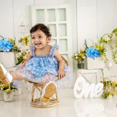 I call myself the "baby giggle hunter" for a reason. Capturing this beautiful, wholehearted laugh during her first birthday studio session was a highlight.