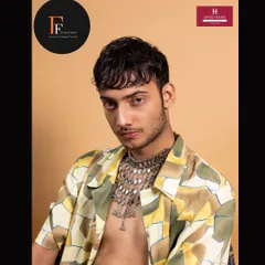 A close-up shot from a male model portfolio shoot, demonstrating natural makeup that enhances features without looking heavy.