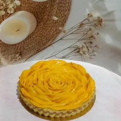 This is my Mango Rosette Tart, a true celebration of the season. I carefully arrange thin slices of fresh, sweet mango over a creamy custard filling in a buttery, handmade tart shell. It's almost too beautiful to eat.