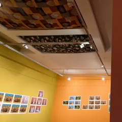 An installation view of my solo show, 'No Longer A Memory'. The gallery walls were painted in vivid colors, and we used fabric panels on the ceiling to transform the space, making it feel like you've stepped inside one of the photographs.
