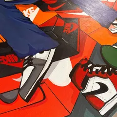 A close-up detail of the sneaker art, showing the clean lines and layered composition of different shoes and branded boxes.