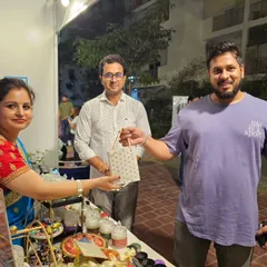 Another happy customer at my stall. I'm eager to hear your thoughts on my products. Your feedback means the world to me and helps my small business grow.