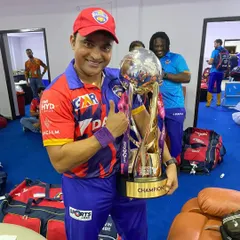 Holding the Legends League Champions trophy in the locker room. A proud moment that shows what hard work can achieve.
